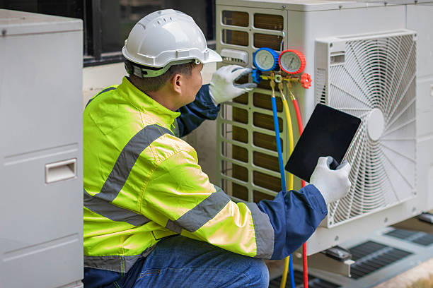 Professional Air Conditioning Repair technician working in Auburn, NY